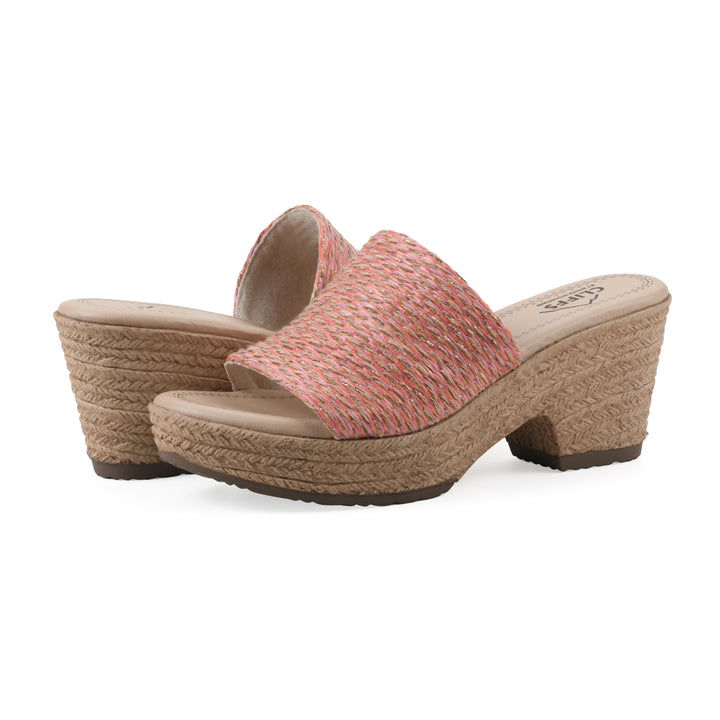 Angle view of a pair of muted orange and gold woven wedge sandals with a braided rope-style sole