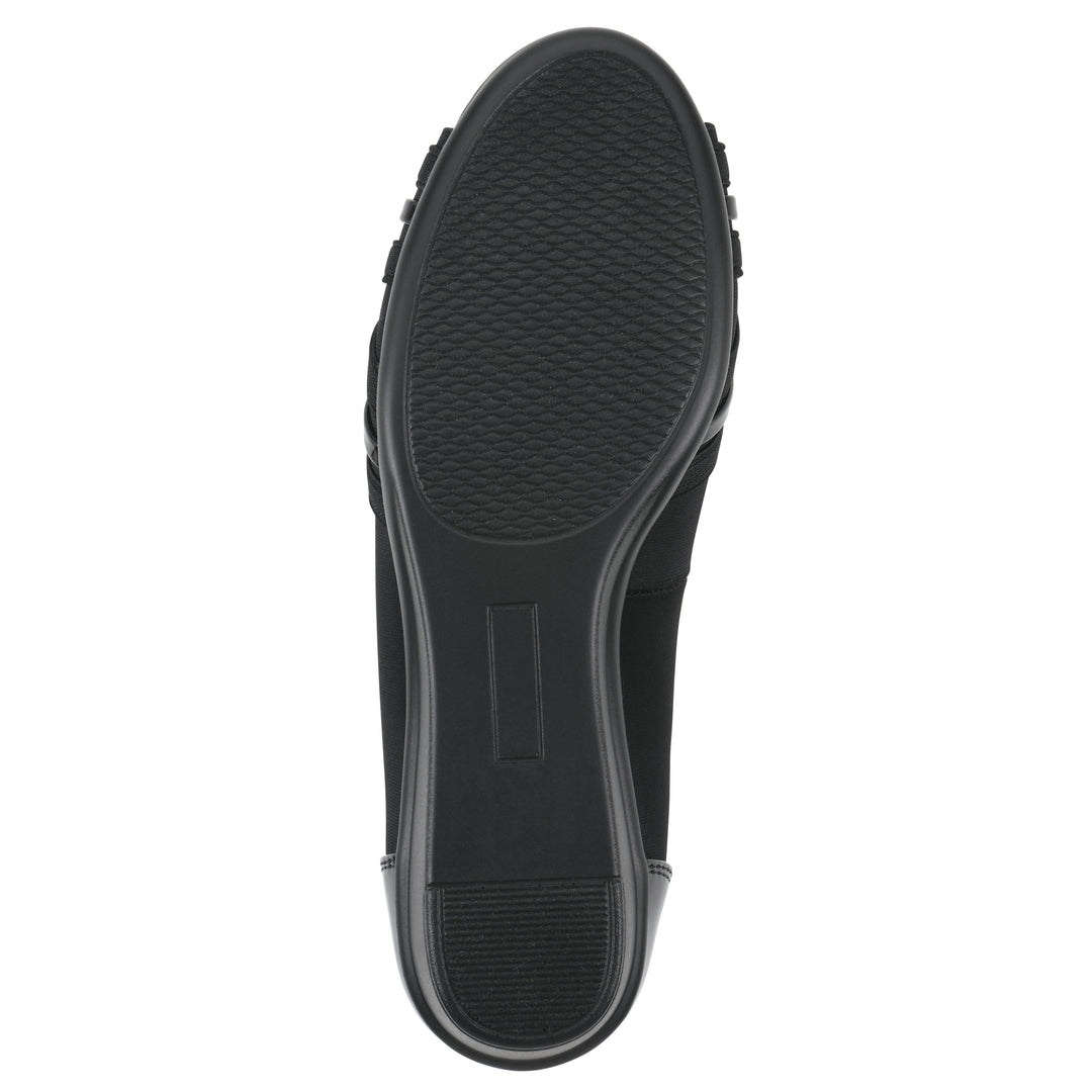 Sole view of slip on wedge with a peep toe in navy blue