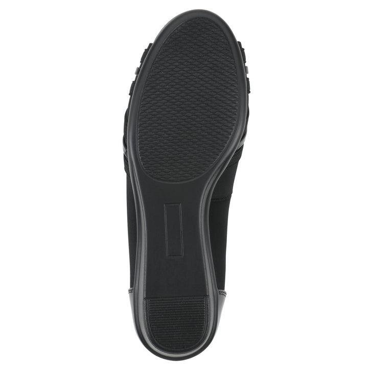 Sole view of slip on wedge with a peep toe in navy blue