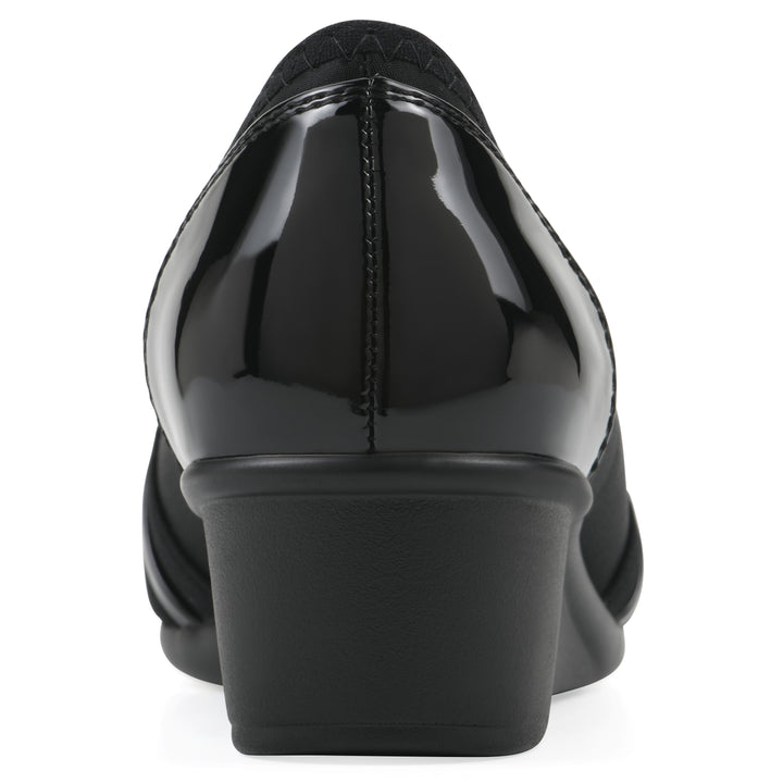 Rear view of slip on wedge with a peep toe in navy blue