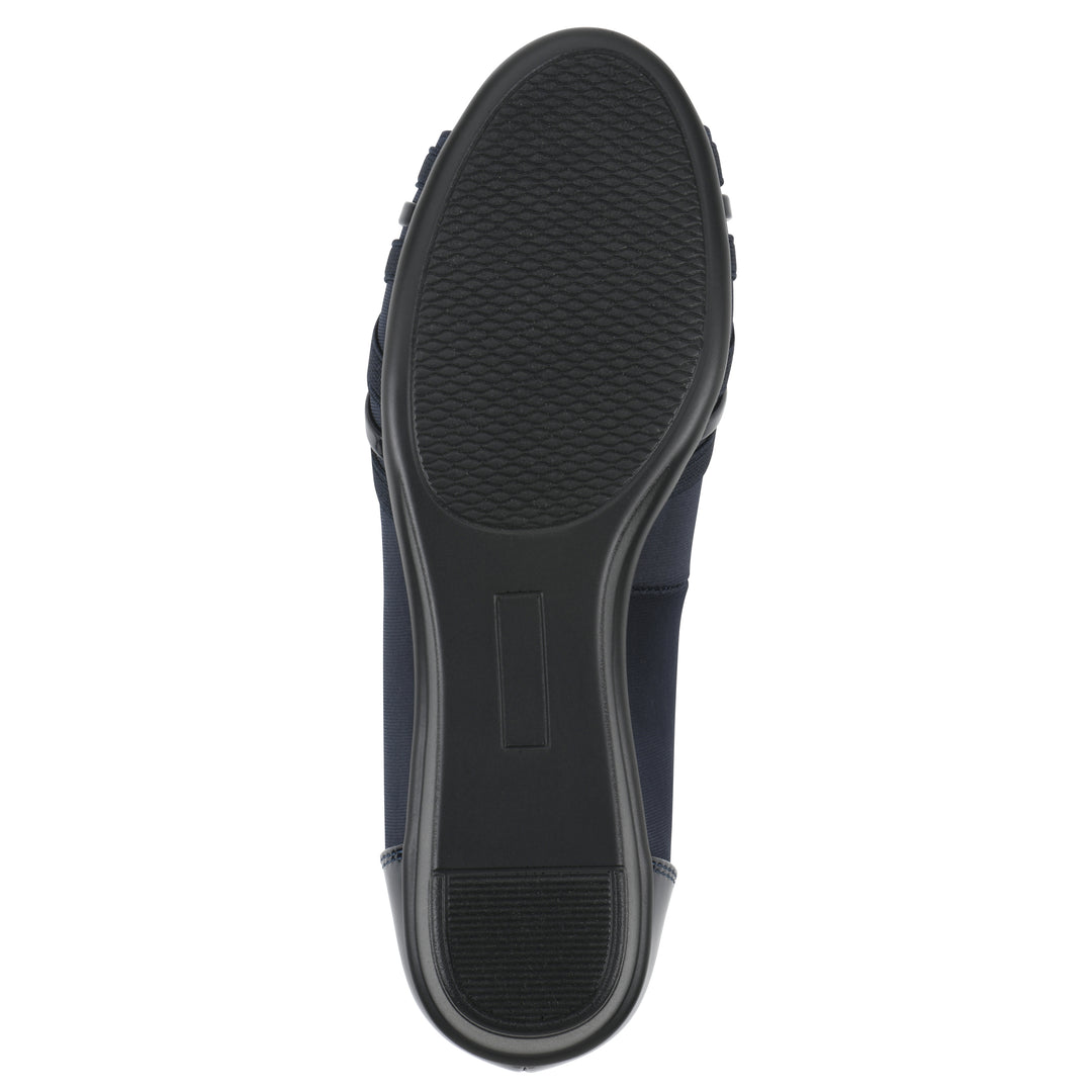 Sole view of slip on wedge with a peep toe in navy blue