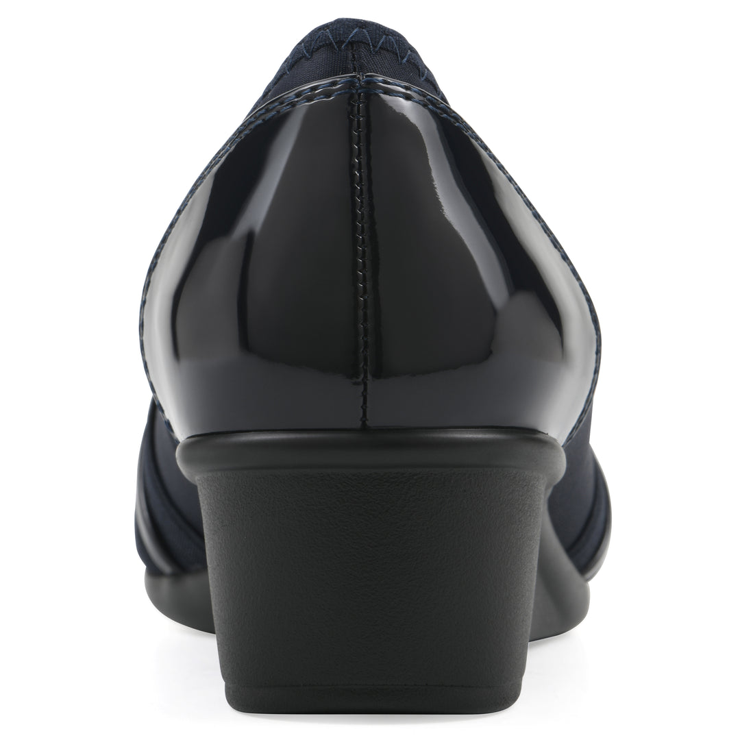 Rear view of slip on wedge with a peep toe in navy blue