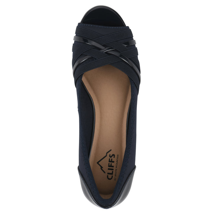 Top view of slip on wedge with a peep toe in navy blue