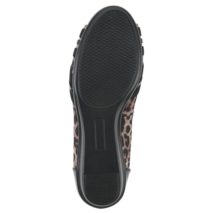 Sole view of slip on wedge with a peep toe in leopard print 