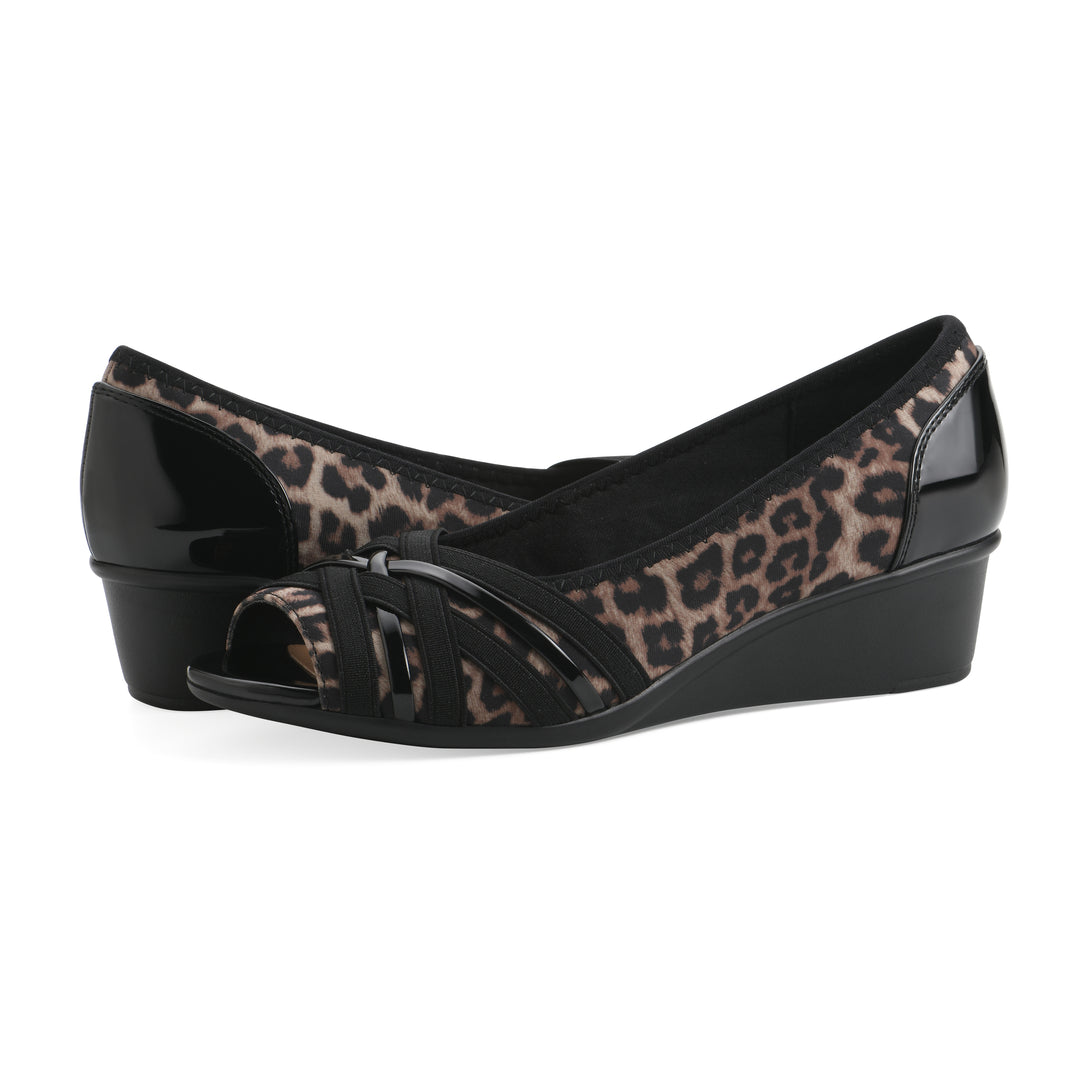 Angel view of a paid of slip on wedge with a peep toe in leopard print 