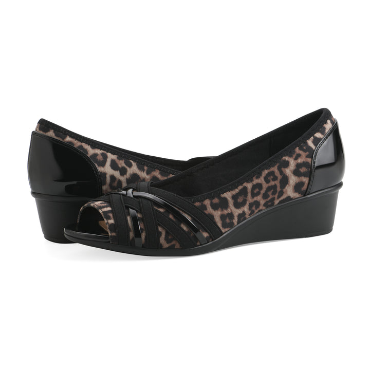 Angel view of a paid of slip on wedge with a peep toe in leopard print 