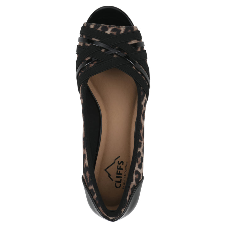 Top view of slip on wedge with a peep toe in leopard print 