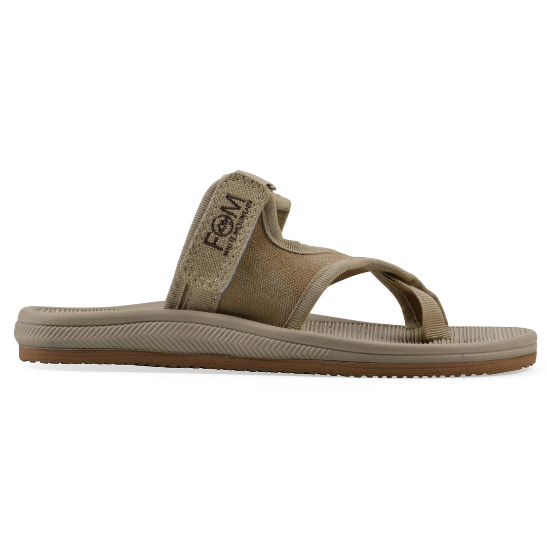 Side view of a khaki fabric thong sandal with velcro center strap and a tan sole