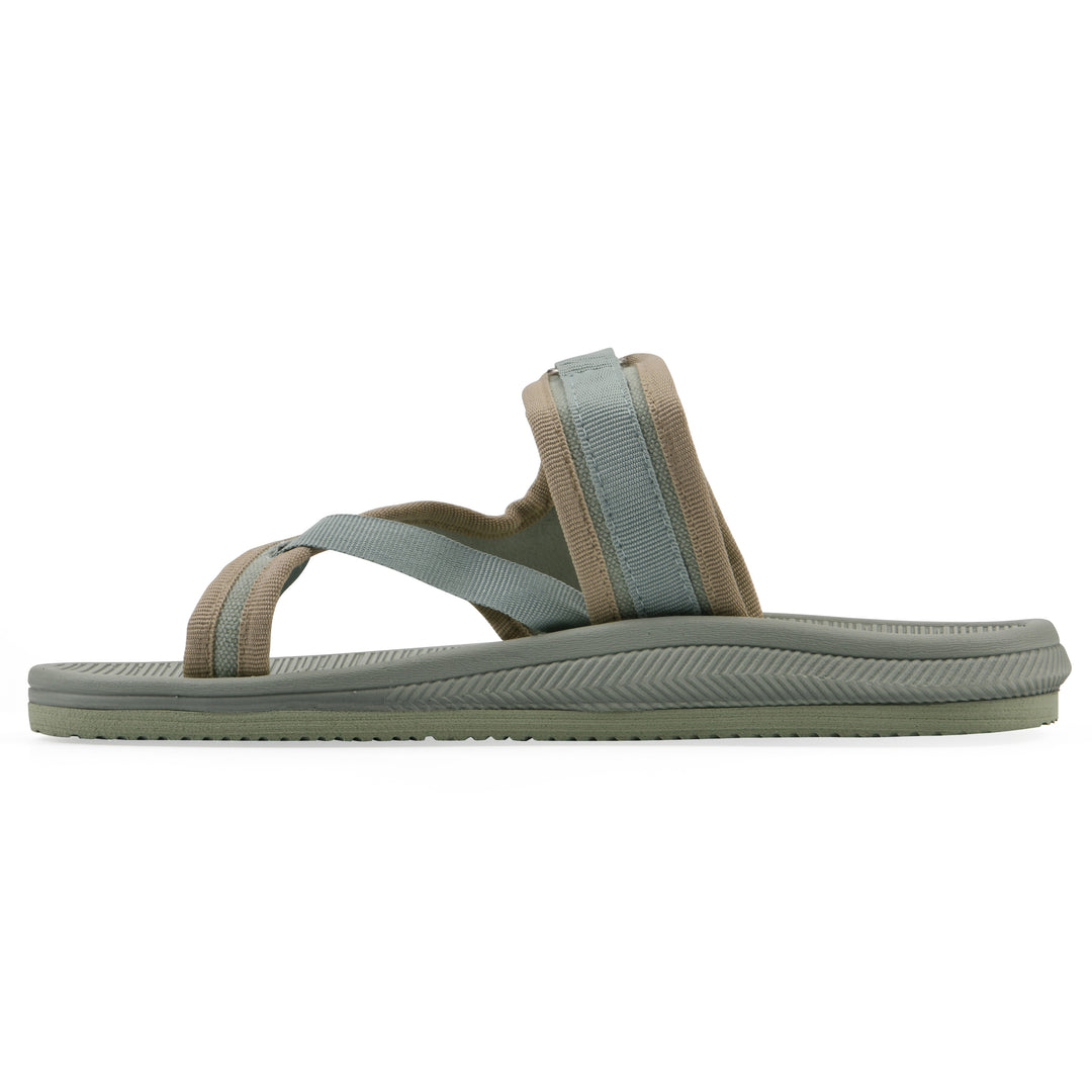 Side view of a sage fabric thong sandal with velcro center strap and a sage sole