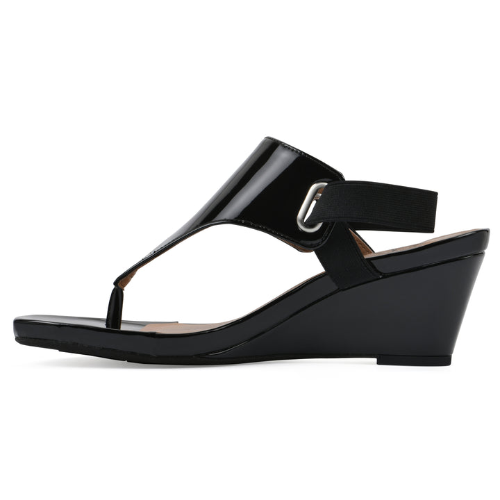 Side view of a black patent thong wedge sandal with a wrapped heel, elastic ankle strap, and black sole