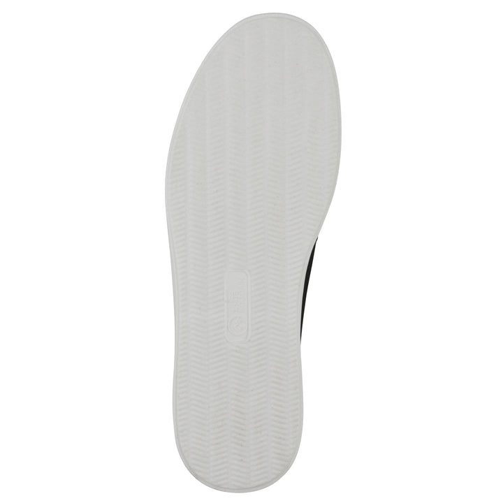 Sole view of a black slip-on sneaker with white sole, and perforated mesh fabric