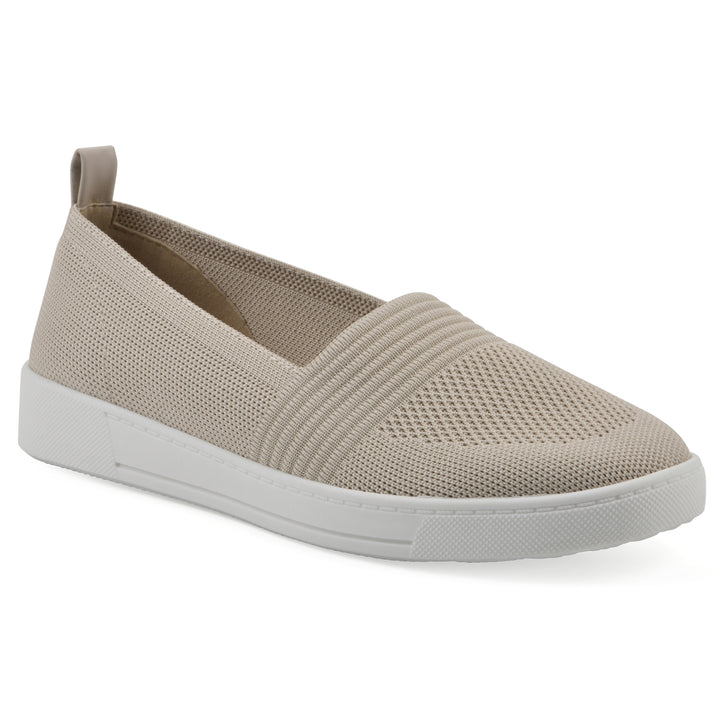 Side view of a taupe slip-on sneaker with white sole, and perforated mesh fabric