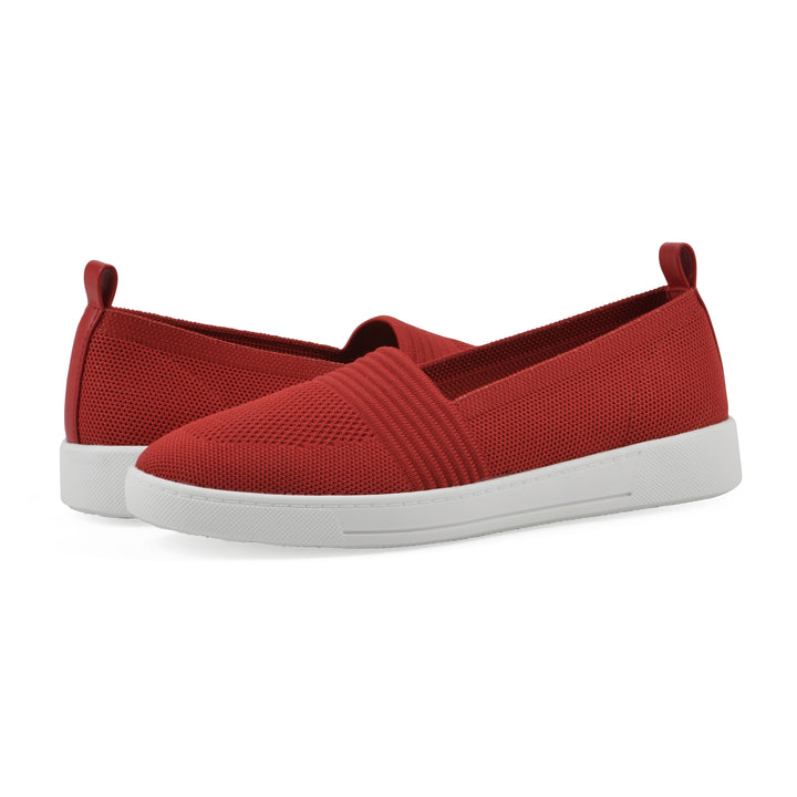 Angle view of a pair of red slip-on sneaker with white sole, and perforated mesh fabric