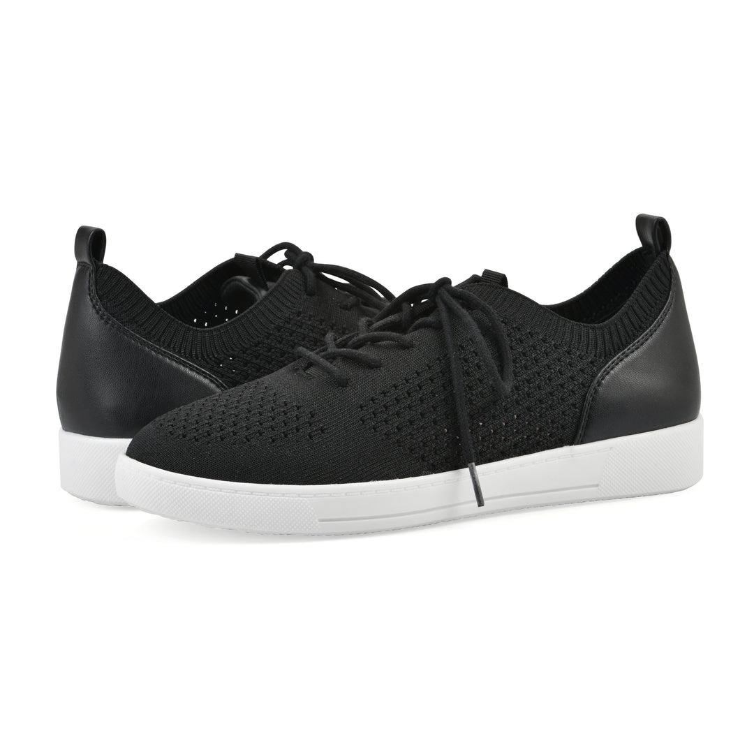 Side view of a pair of black sneaker with white sole, lace-up design and perforated mesh fabric