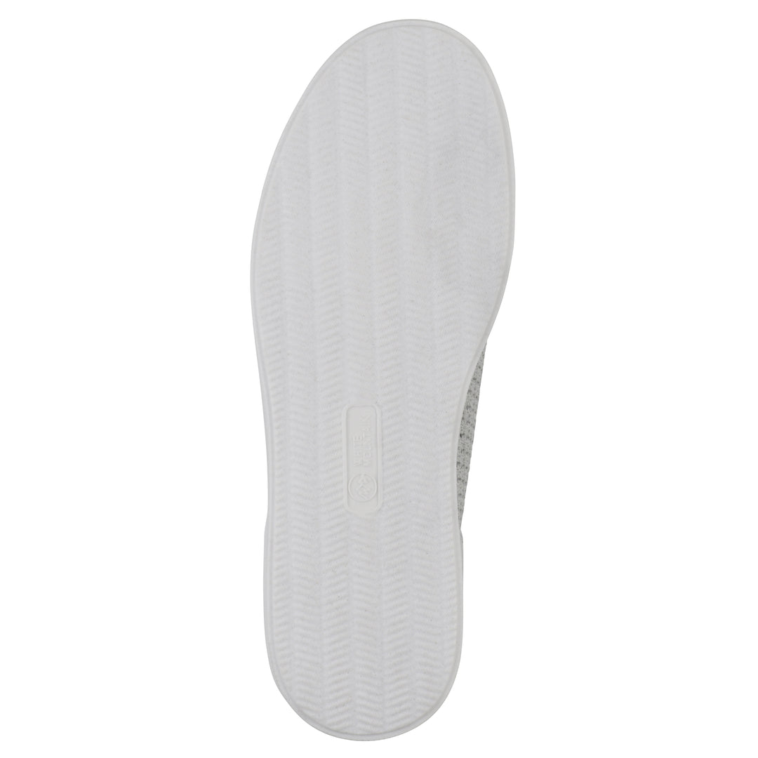 Sole view of a gray sneaker with white sole, lace-up design and perforated mesh fabric
