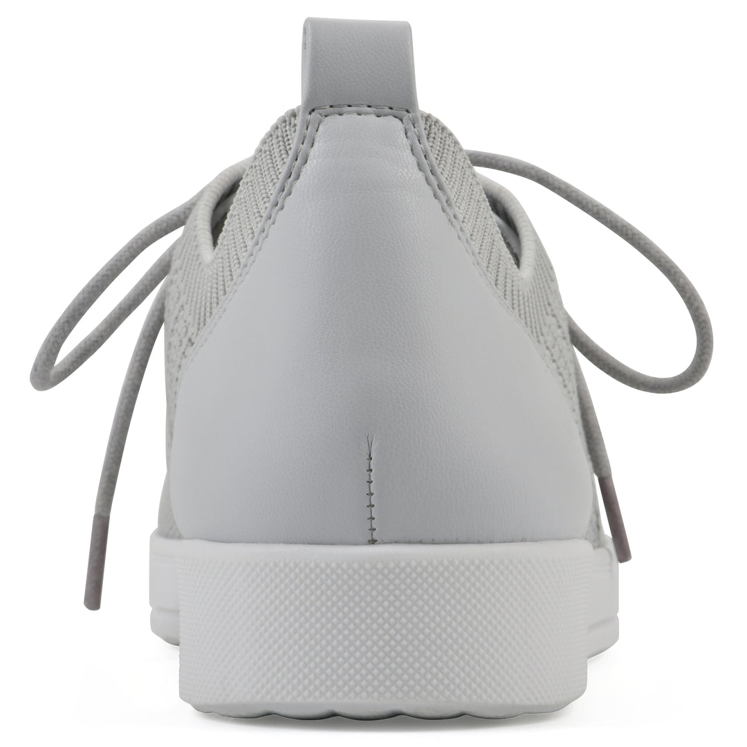 Heel view of a gray sneaker with white sole, lace-up design and perforated mesh fabric