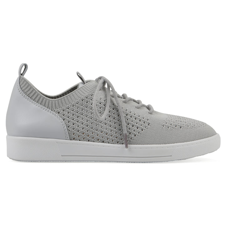Side view of a gray sneaker with white sole, lace-up design and perforated mesh fabric