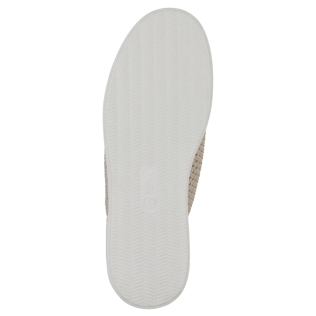 White Sole view of a taupe sneaker with lace-up design and perforated mesh fabric