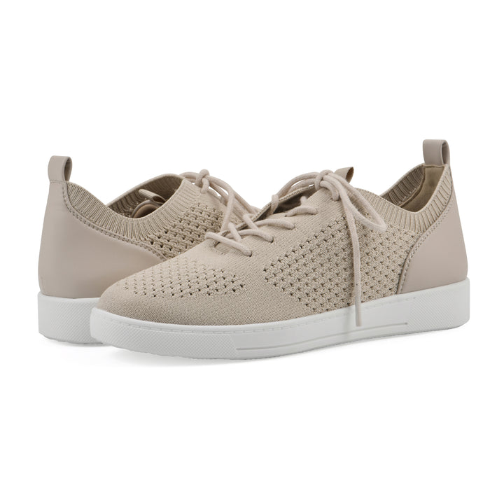 Angle view of a pair of taupe sneaker with lace-up design and perforated mesh fabric