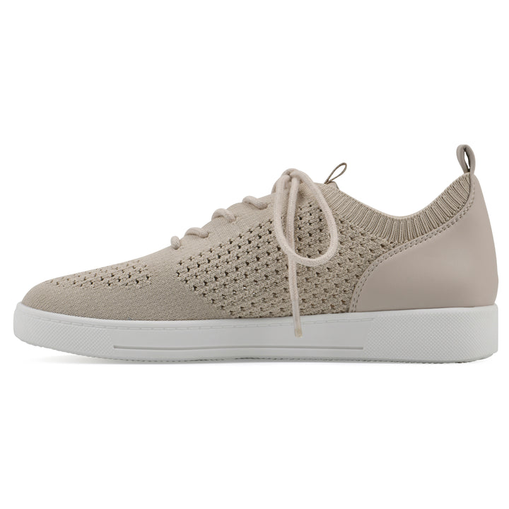 Side view of a taupe sneaker with lace-up design and perforated mesh fabric