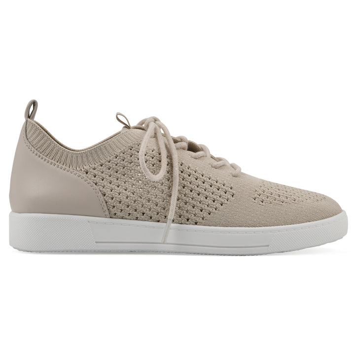 Side view of a taupe sneaker with lace-up design and perforated mesh fabric