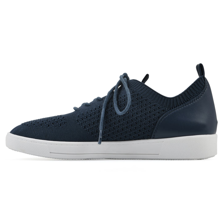 Side view of a navy sneaker with lace-up design and perforated mesh fabric
