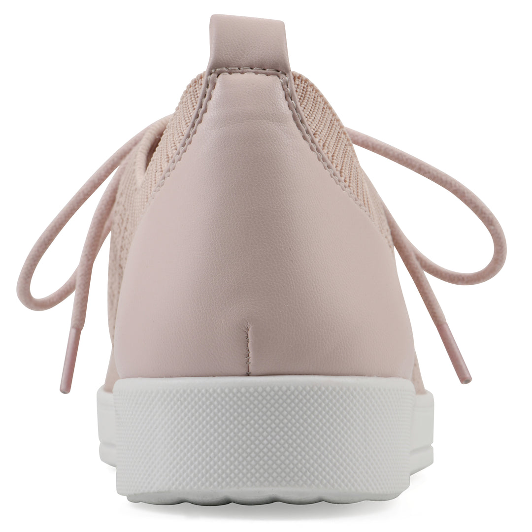 Rear view of a pink sneaker with white sole, lace-up design and perforated mesh fabric