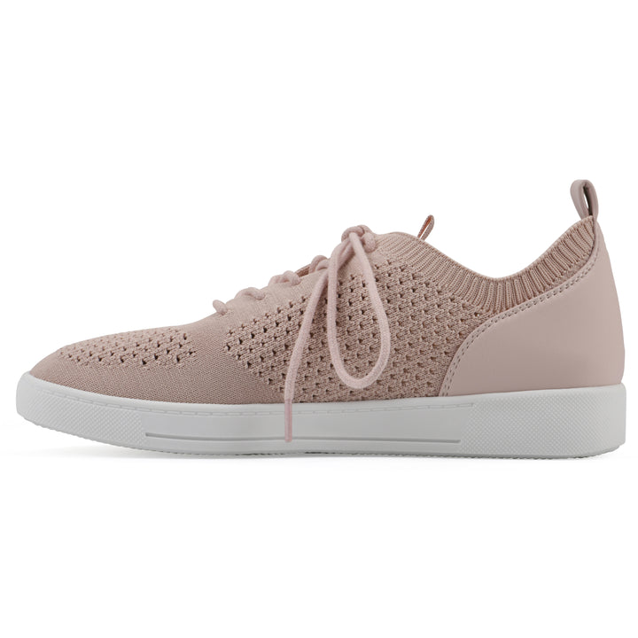 Side view of a pink sneaker with white sole, lace-up design and perforated mesh fabric
