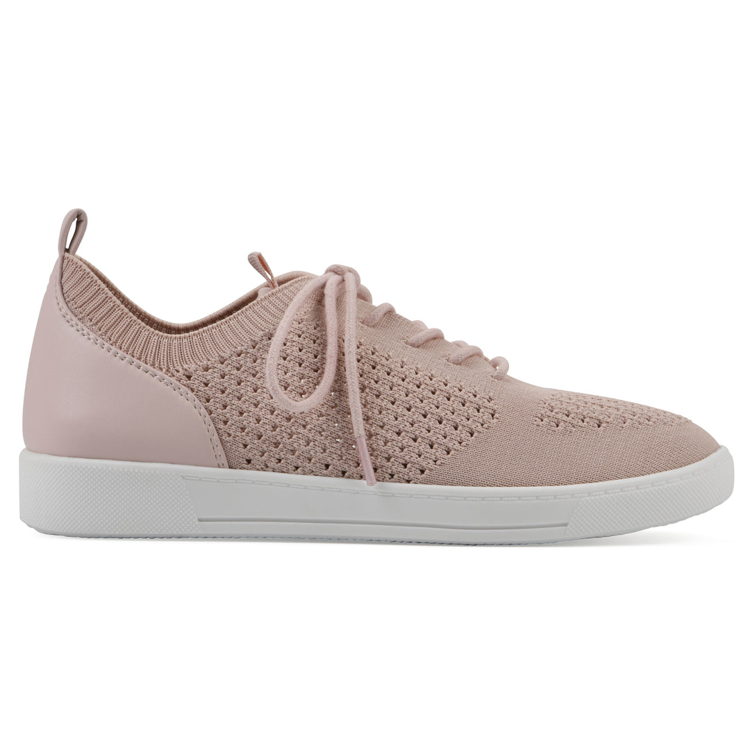 Side view of a pink sneaker with white sole, lace-up design and perforated mesh fabric
