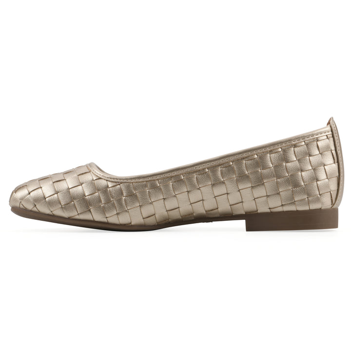 Side view of a light gold faux leather, woven pattern flat with a brown sole