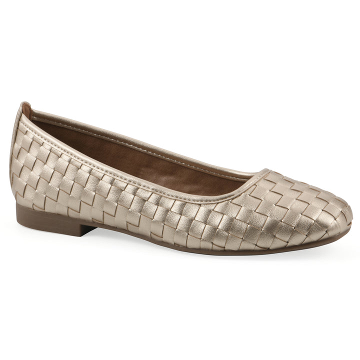 Angle view of a light gold faux leather, woven pattern flat with a brown sole