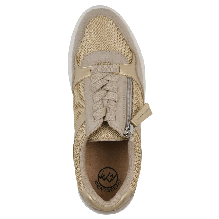 Top view of a beige sneaker with white sole, zipper entry and faux laces detail