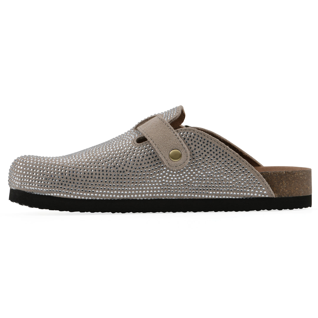 Side view of a tan micro-sequined backless clog with adjustable buckle strap and black sole