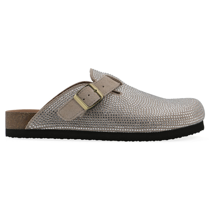 Side view of a tan micro-sequined backless clog with adjustable buckle strap and black sole