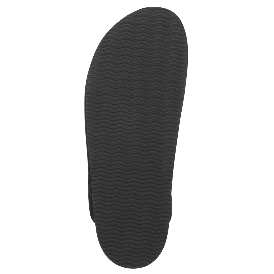 Sole view of a black and white multi felt and suede backless clog with a black sole