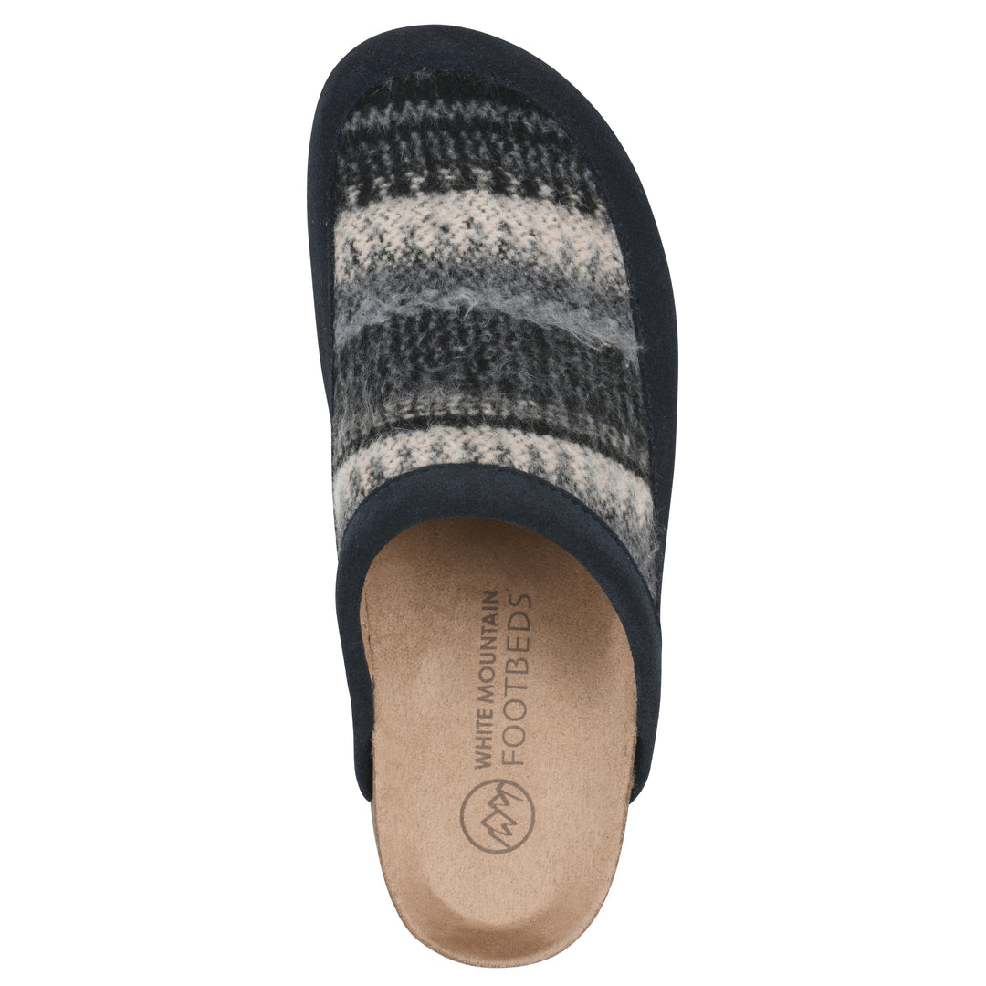 Top view of a black and white multi felt and suede backless clog with a black sole