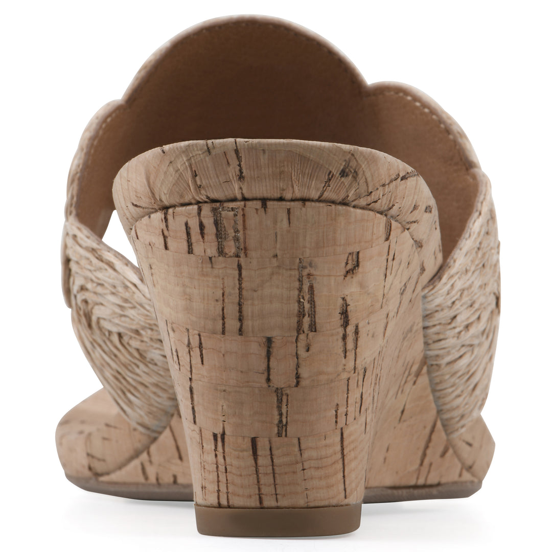 Rear view of a cork print wedge sandal with natural cream raffia thong design 