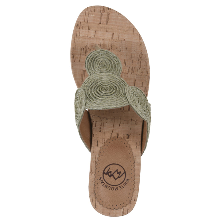 Top view of a cork print wedge sandal with green raffia thong design 