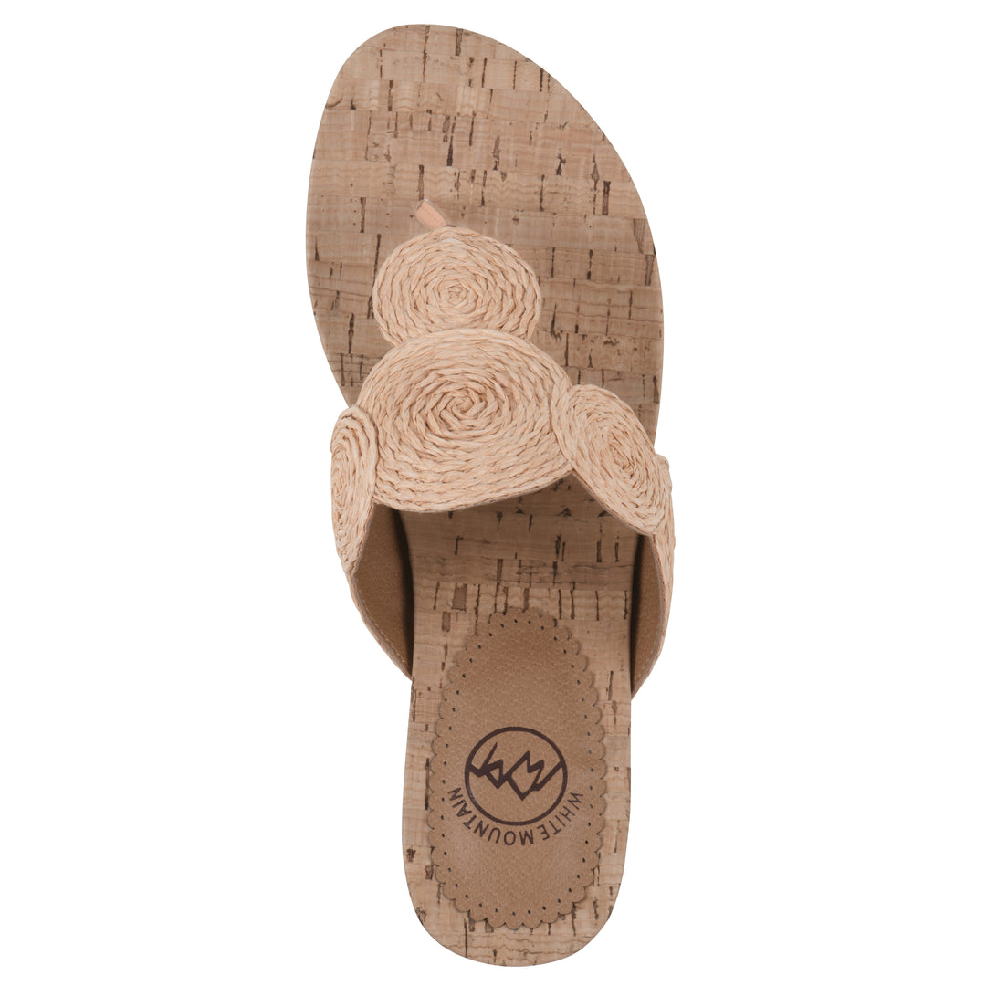 Top view of a cork print wedge sandal with natural apricot color raffia thong design 