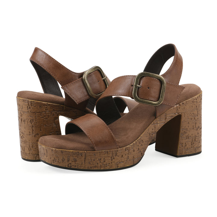 Angle view of a pair of brown platform sandals with ankle buckle and a brown, faux cork sole