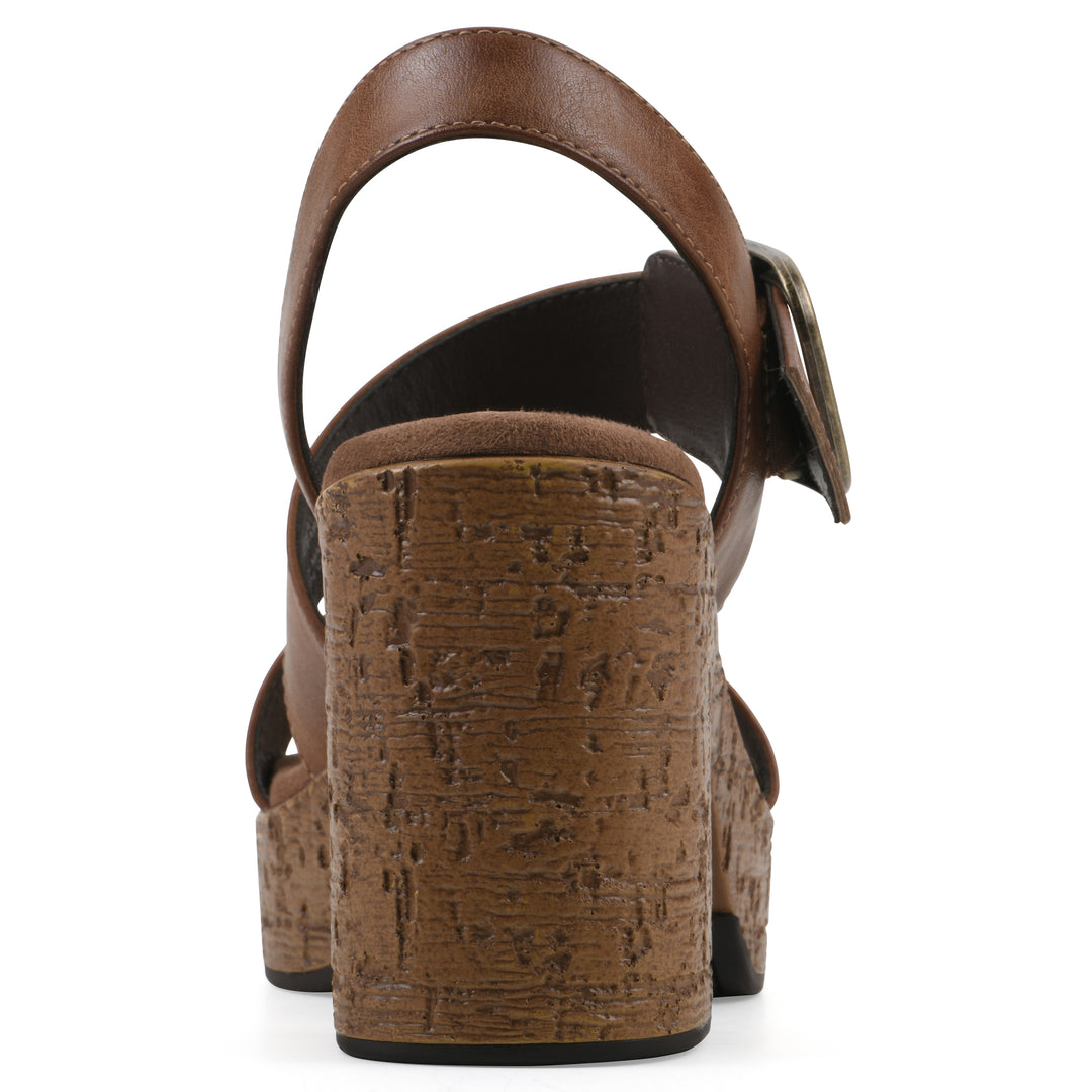 Rear view of a brown platform sandal with ankle buckle and a brown, faux cork sole