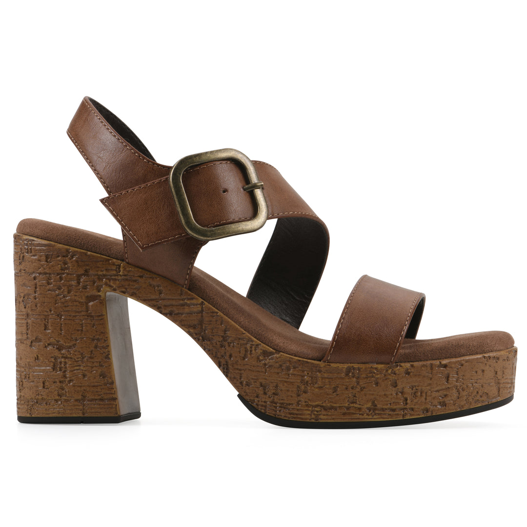 Side view of a brown platform sandal with ankle buckle and a brown, faux cork sole