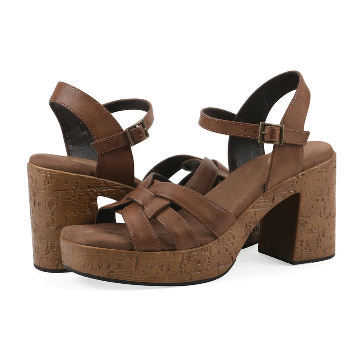 Angle view of a pair of brown faux leather platform sandals with buckle style ankle strap and a brown molded cork sole