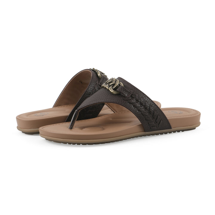 Angle view of a pair of brown thong sandals with metal embellishment and a brown sole