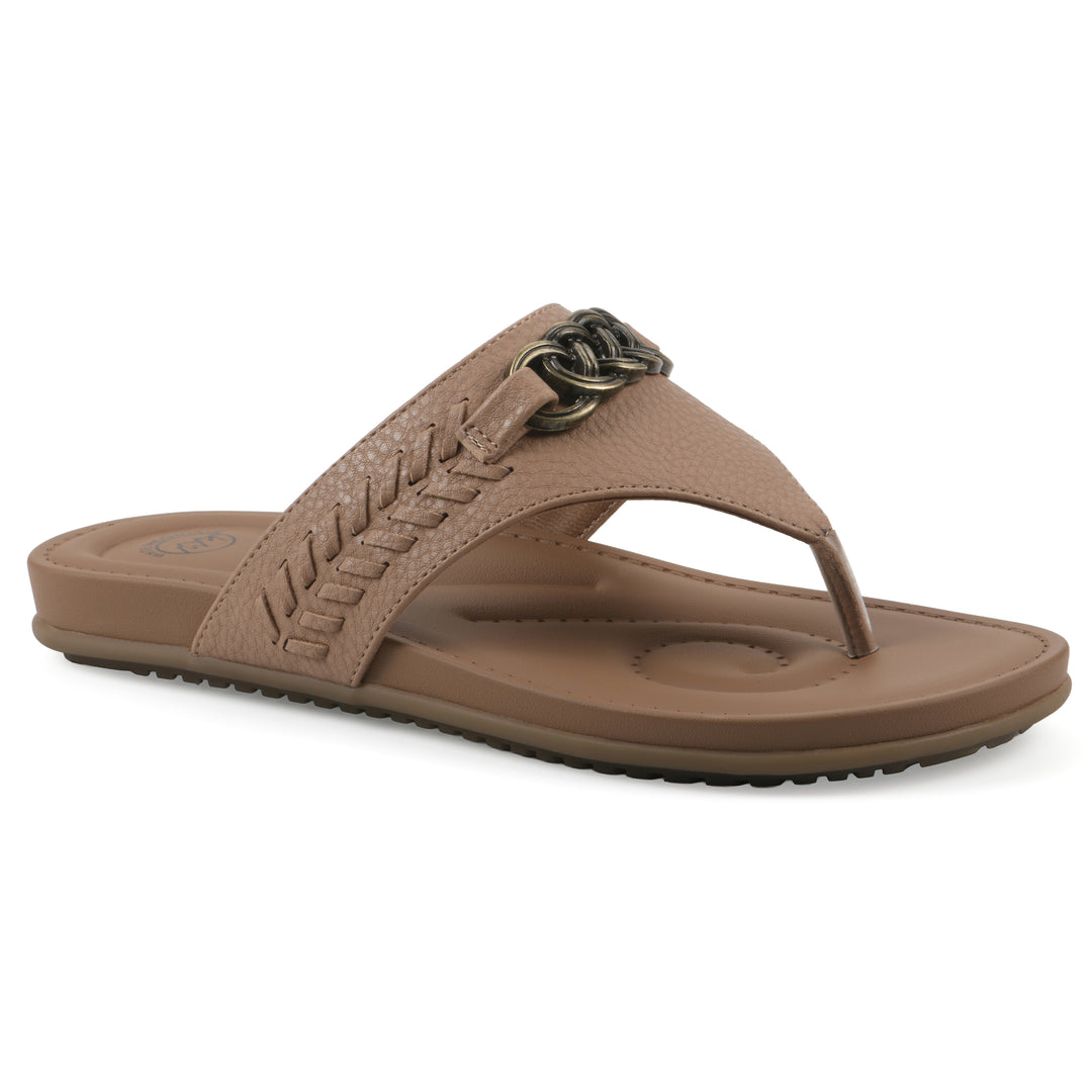 Side view of a brown thong sandal with a metal emblem and a brown sole