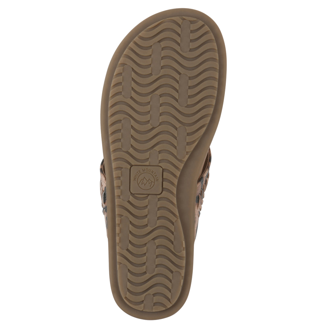 Rear view of a leopard print thong sandal with metal embellishment and a brown sole