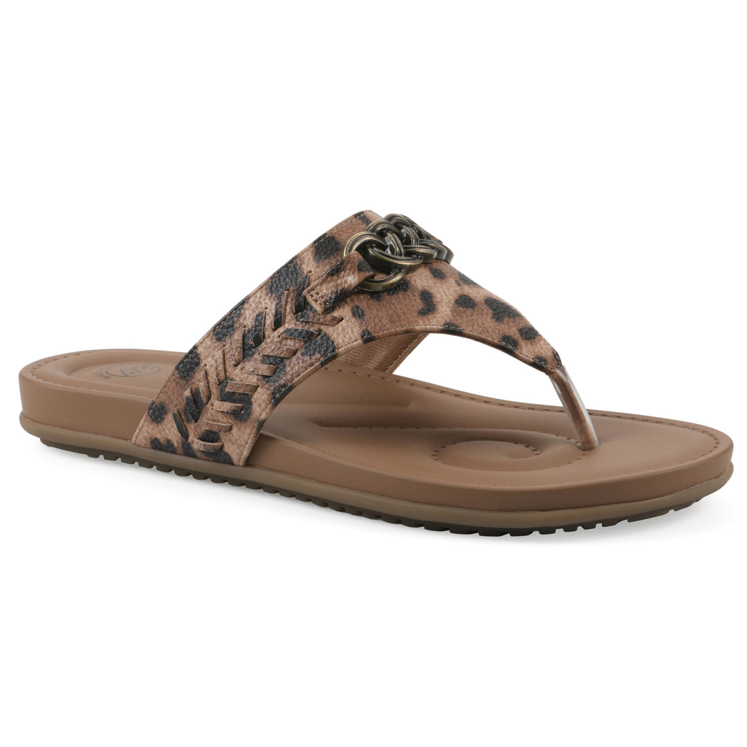 Side view of a leopard print thong sandal with a metal emblem and a brown sole