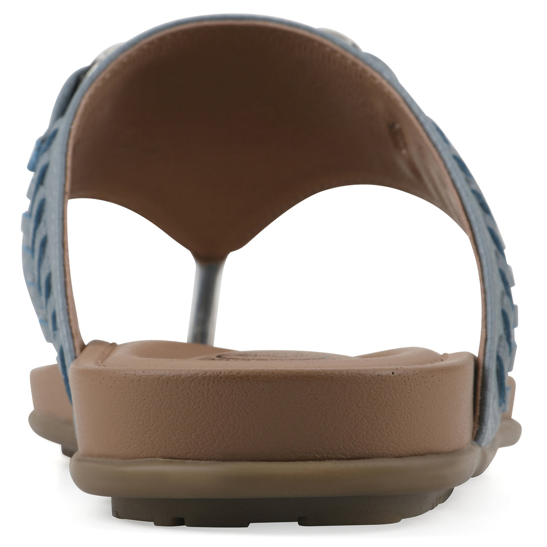 Rear view of a blue thong sandal with metal embellishment and a brown sole