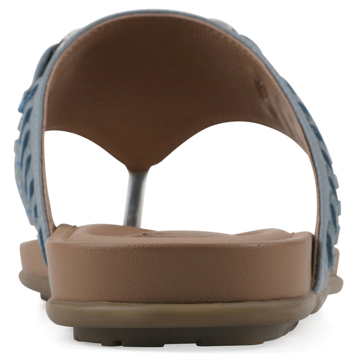 Rear view of a blue thong sandal with metal embellishment and a brown sole