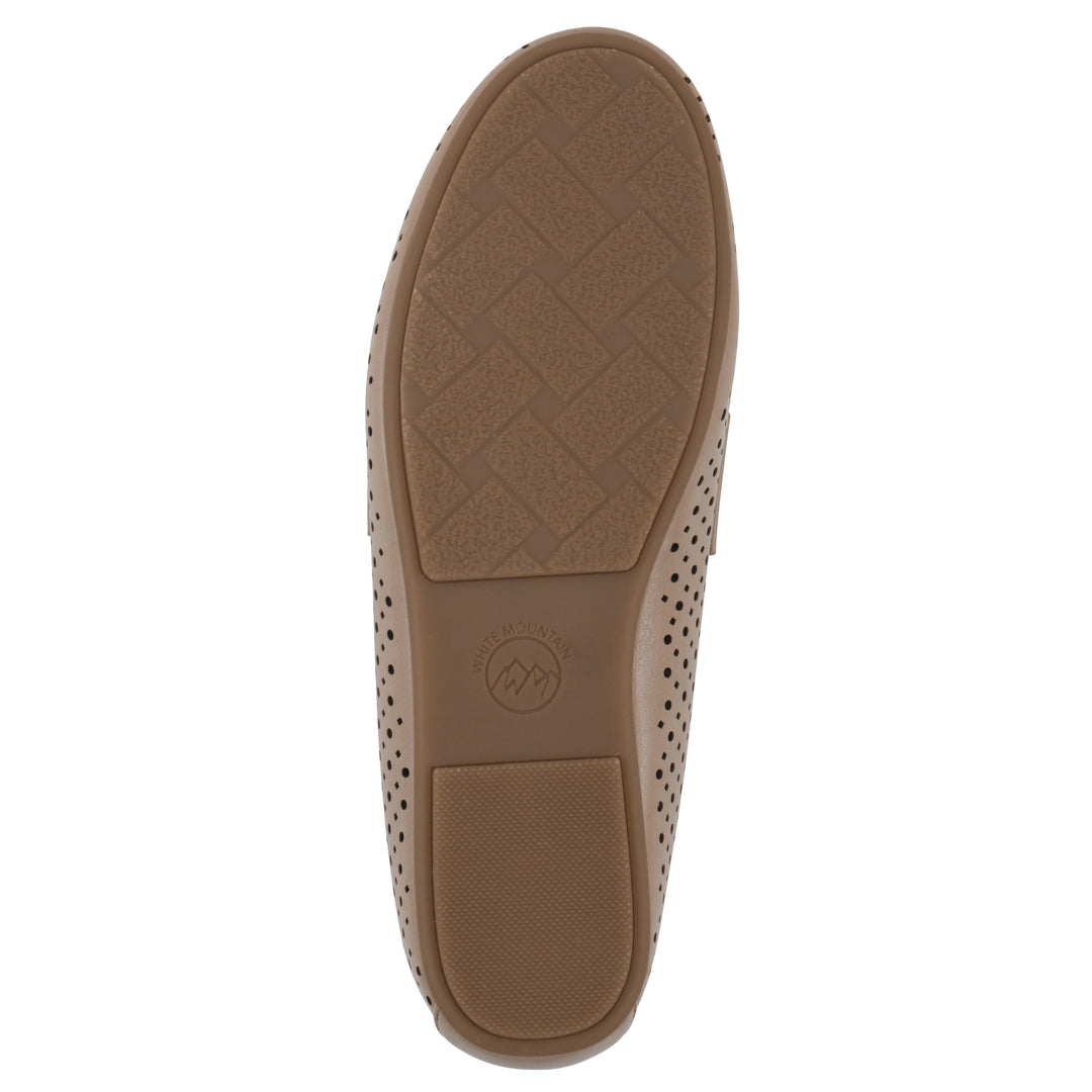 Sole view of a beige perforated loafer shoe 